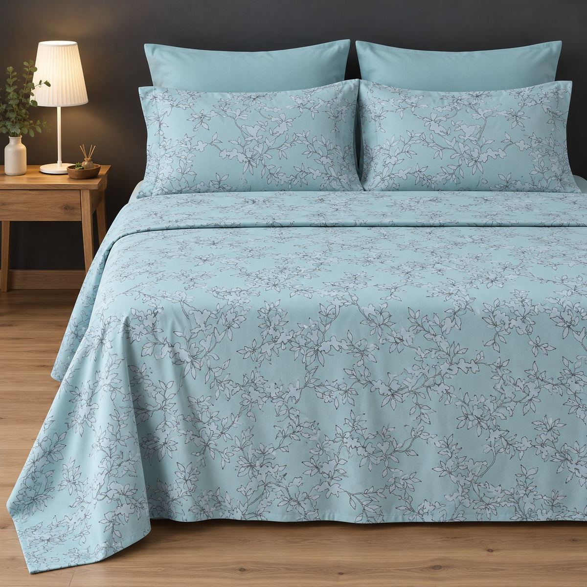 Whimsy Weave Aqua Vine Print Bedsheet Set on a king bed