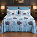 Whimsy Weave Blue Meadow Print Bedsheet Set on a bed
