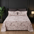 Whimsy Weave Blush Berry Vine Print Bedsheet Set on a bed