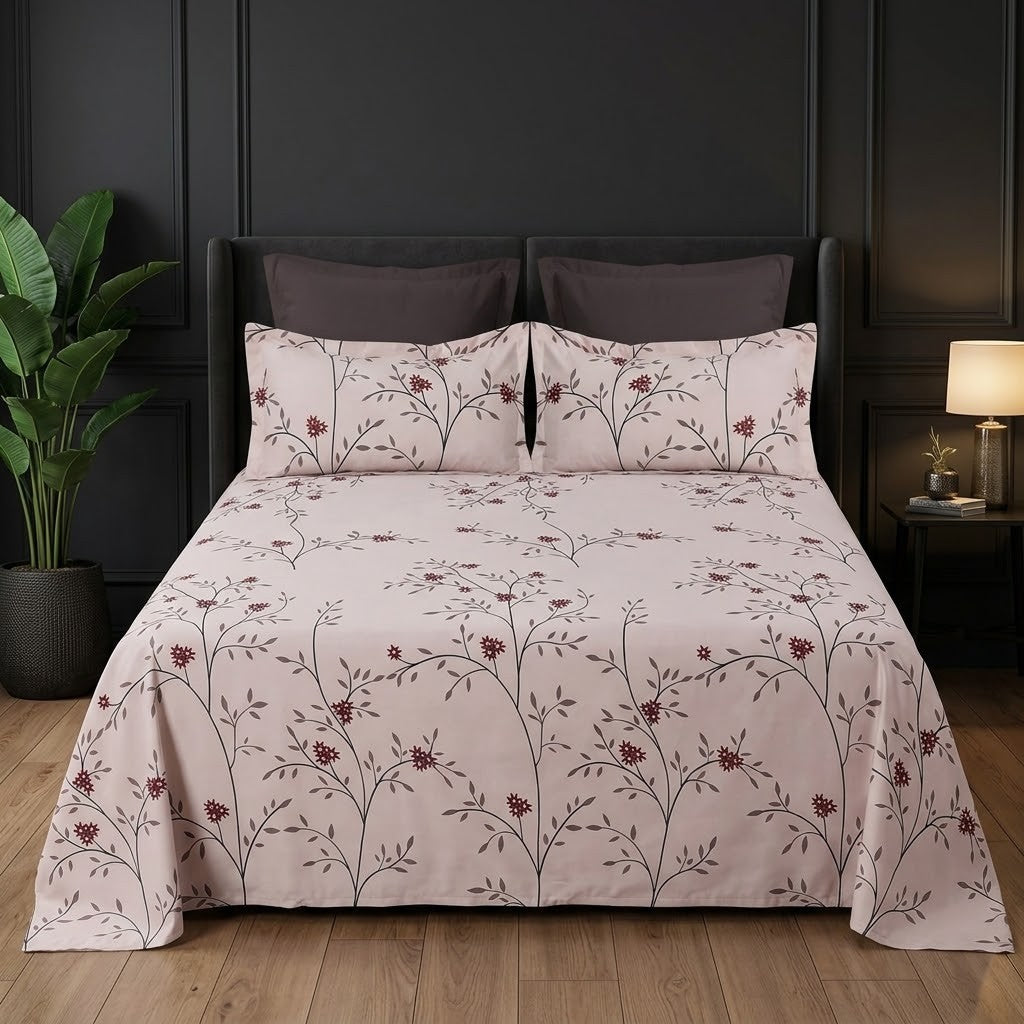 Whimsy Weave Blush Berry Vine Print Bedsheet Set on a bed
