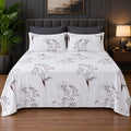 Whimsy Weave Dandelion Print Bedsheet Set on a bed