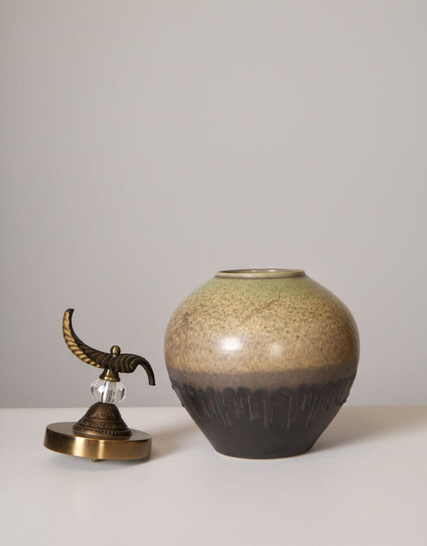 Earth-Toned Ceramic Jar with Ornate Lid