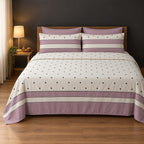 Whimsy Weave Mauve Polka Dot Print Bedsheet Set on a bed