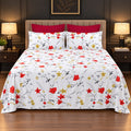 Whimsy Weave Red Starflower Print Bedsheet Set on a bed
