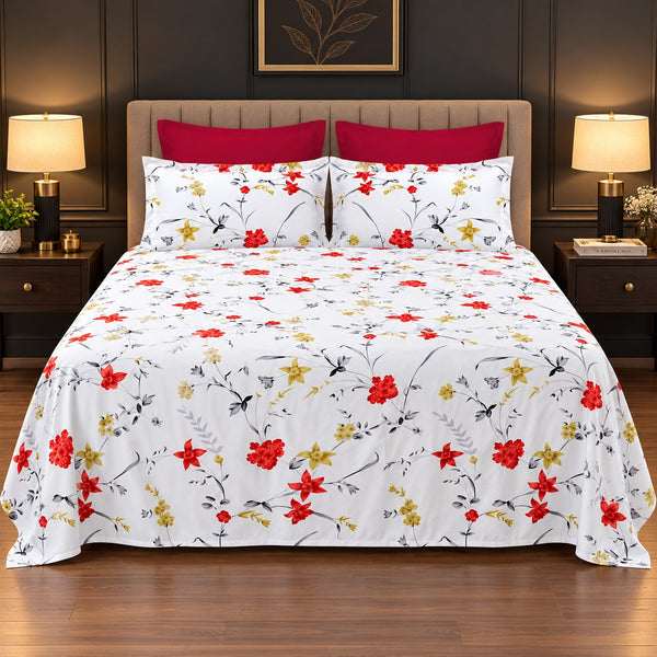 Whimsy Weave Red Starflower Print Bedsheet Set on a bed