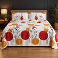 Whimsy Weave Red Sun Bloom Print Bedsheet Set on a bed