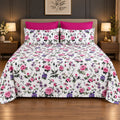 Whimsy Weave Rose Meadow Print Bedsheet Set on a bed