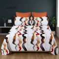 Whimsy Weave Rust Wave Print Bedsheet Set on a bed