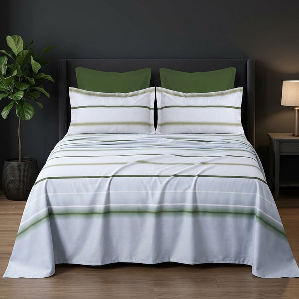 Whimsy Weave Sage Stripe Print Bedsheet Set on a bed