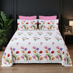 Whimsy Weave Tulip Garden Print Bedsheet Set on a bed